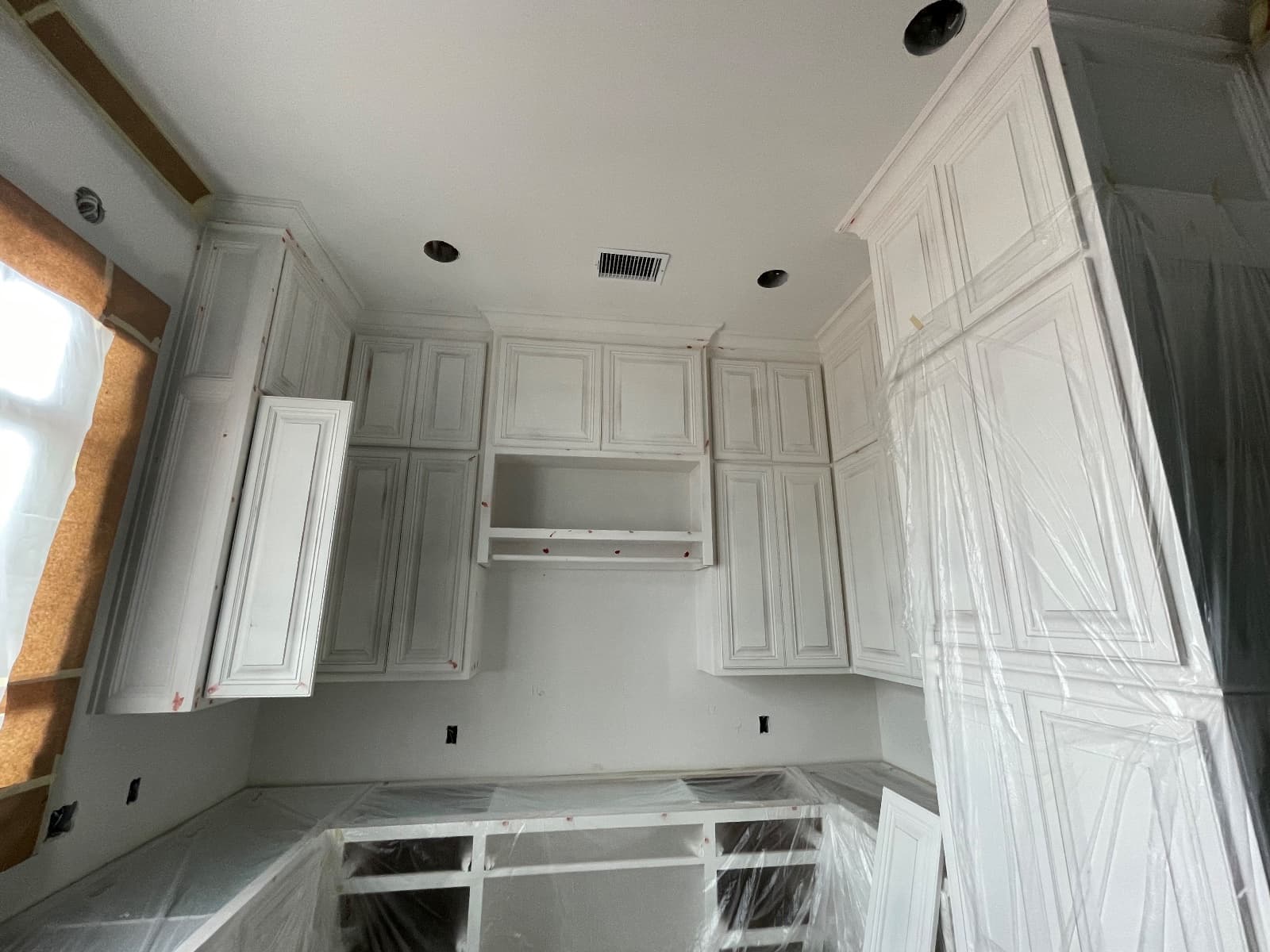 Cabinet Painting project by Luxeline Painters